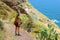 Traveler hiker woman enjoying landscape in Tenerife, Spain. Natural tourism backpacker trekking adventure concept