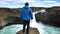 Traveler hiking at Aldeyjarfoss Waterfall in Iceland.