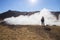 Traveler at Hverarondor Hverir hot springs, Iceland