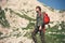 Traveler Man bearded with backpack mountaineering