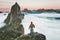 Traveler man on cliff alone enjoying sunset Segla mountain