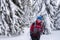 Traveler man enjoying a wonderful adventure in the winter mountains