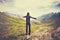 Traveler Man jumping with mountains landscape on background