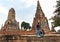 Traveler man and women with backpack walking in temple Ayuttaya ,Thailand