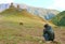 Traveler Photographing the Famous Gergeti Trinity Church in the Town of Stepantsminda, Kazbegi, Georgia