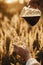 Traveler pouring fresh hot coffee in glass cup on background of sunny warm light in rural herbs. Alternative coffee brewing