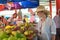 Traveler shopping on traditional Victoria food market, Seychelles.