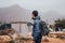 Traveler stand in front of rural landscape in Taroudant Morocco.