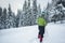 Traveler stands in a deep snow