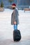 Traveler with suitcase arrive airport railway station urban background. Hipster ready enjoy travel. Carry travel bag