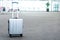 traveler suitcases in airport terminal