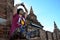 Traveler thai woman play yoka between wait sunset at Bagan