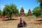 Traveler thai woman ride motorcycle travel around Ancient City in Bagan