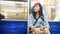Traveler thai woman sitting on train from Tokyo city go to Saitama city