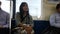 Traveler thai woman sitting on train from Tokyo city go to Saitama city