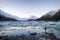 A traveler viewing the icebergs and snow mountains New Zealand