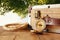 Traveler vintage luggage and compass on wooden table