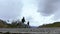 Traveler Walking On The Road In The Mountains Near Khunjerab Pass, Pakistan China Border