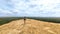 Traveler walking through sigiriya and enyoing the scenic view of the pidurangala rock in Sri Lanka