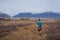 A traveler walks through the taiga in the Chara desert