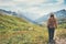 Traveler Woman hiking in mountains