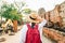 Traveler woman walk on ancient ruins