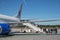 Travelers entering an airplane ready for departure at Eindhoven airport