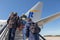 Travelers entering an airplane ready for departure at Eindhoven airport