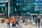 Travelers in front of the glassy main entrance of Berlin Central Station in the center of the city