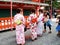 Travelers japanese woman people wear traditional clothing kimono yukata travel visit and pray shake Kau Chim omikuji or siam-si