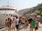 Travelers of King Saron passenger catamaran come ashore in the port of Symi, Symi island, Greece