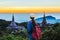 Travelers looking at Landscape of two pagoda in an Inthanon mountain, Chiangmai, Thailand