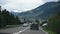 Travelers people driving car on the highway passed Oetztal tiroler village