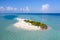 Travelers on a small sandy island in the Indian Ocean