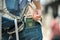 Travelers take their Korean passports out of their jeans back pockets