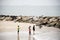 Travelers thai people walking relax on Saeng Chan Beach in Rayong, Thailand