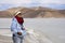 Travelers thai woman travel visit at mountains and Pangong lake while winter season at Leh Ladakh in Jammu and Kashmir, India