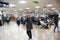 Travelers thai women and Indian and foreign walk and waiting check in inside of Indira Gandhi International Airport at terminal 2