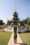 Travelers thai women people travel visit respect praying and use smart mobile phone take photo ancient ruins building shrine of
