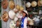 Travelers thai women people travel visit and shopping select vietnamese straw hat in local souvenir gift shop in Ba Dinh Old Town