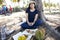 Travelers thai women sit rest and eating Hainanese Chicken Rice and Chicken Biryani and durian fruits on beach at Banton Beach and