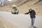 Travelers thai women travel visit and hitchhike vehicle on Srinagar highway at Leh Ladakh while winter season in Jammu and Kashmir