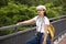 Travelers thai women travel walking on footpath beside Nanbin road go to visit Tiantan temple in Chaozhou, China