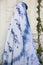 Travelers thai young women wear indigo tie dye painting shawl and scarf posing portrait for take photo in garden at outdoor of