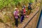 Traveling around the island of Sri Lanka by train. Local residents along the railway