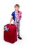 Traveling with children. Tourism. Cute little girl and big red suitcase isolated on white background