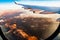 Traveling by plane is very exciting.  View of the mountains through the window of the plane