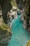 Traveling to wonderful nature in slovenia, canyon with turquoise river in julian alps