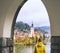 Traveling tourist looking at Bled Lake, Slovenia, Europe