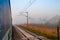 Traveling by train in India. View from an opened train door.